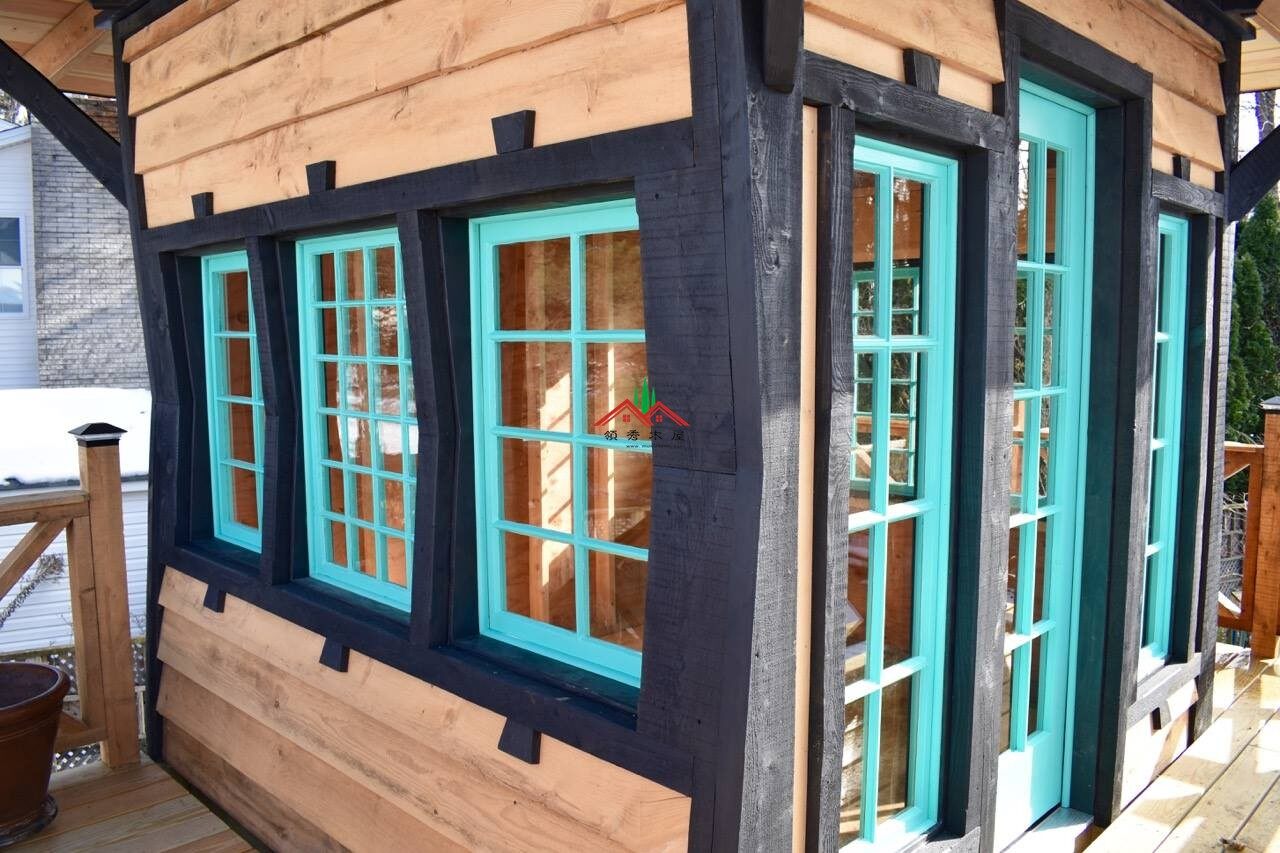 特色雙層屋頂藍(lán)色庭院小樹屋