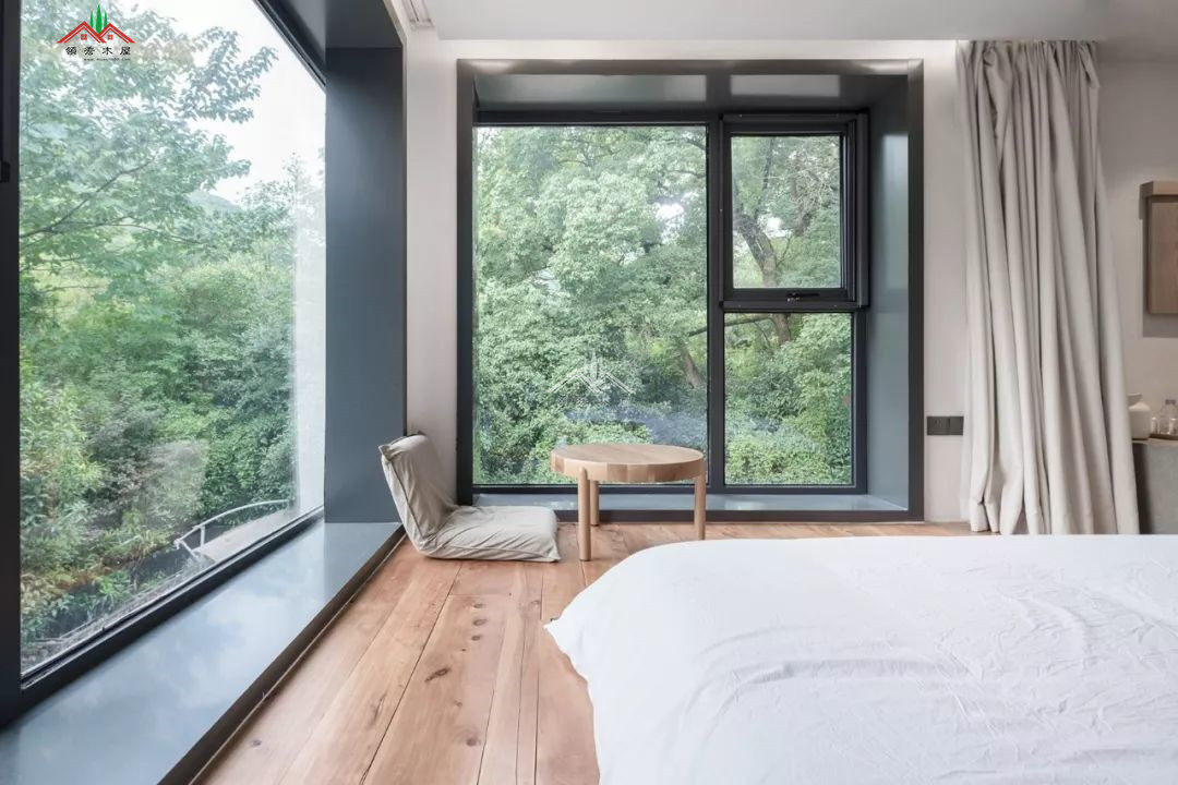 簡(jiǎn)約混磚木屋